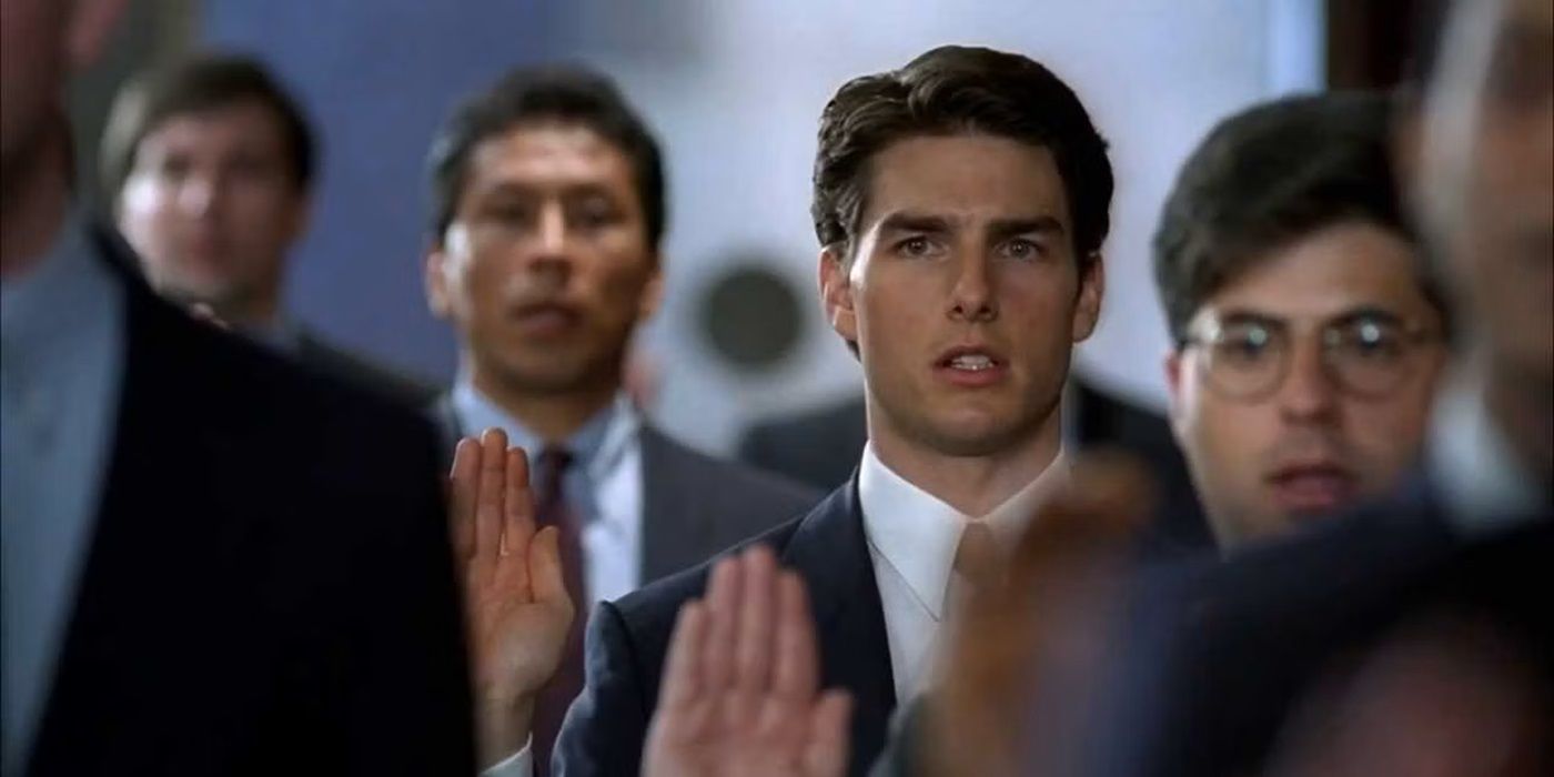 Mitch McDeere being sworn in with a group of lawyers in The Firm