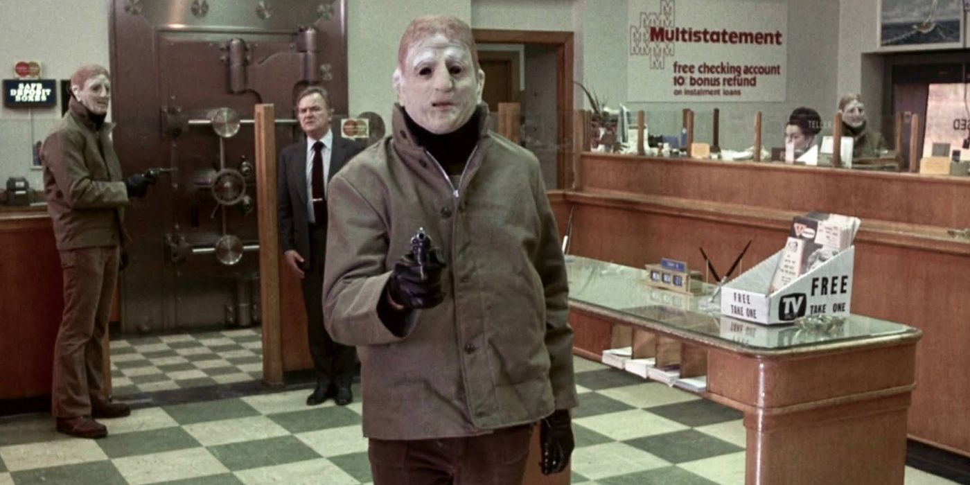 A masked bank robber holds patrons at gunpoint in &lsquo;The Friends of Eddie Coyle&rsquo; (1973)