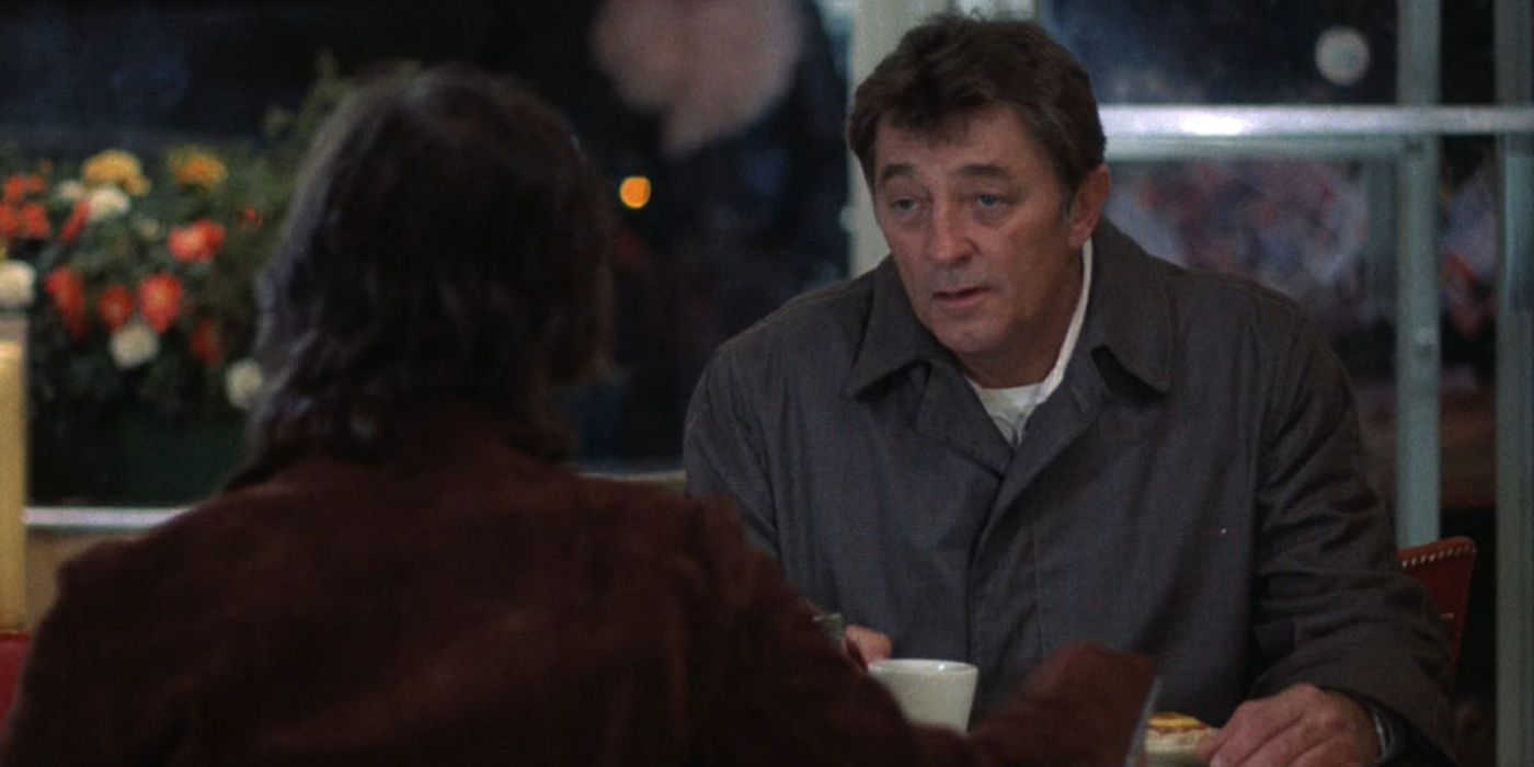 Eddie Coyle (Robert Mitchum) sits in a diner meeting with an ATF agent in &lsquo;The Friends of Eddie Coyle&rsquo; (1973)