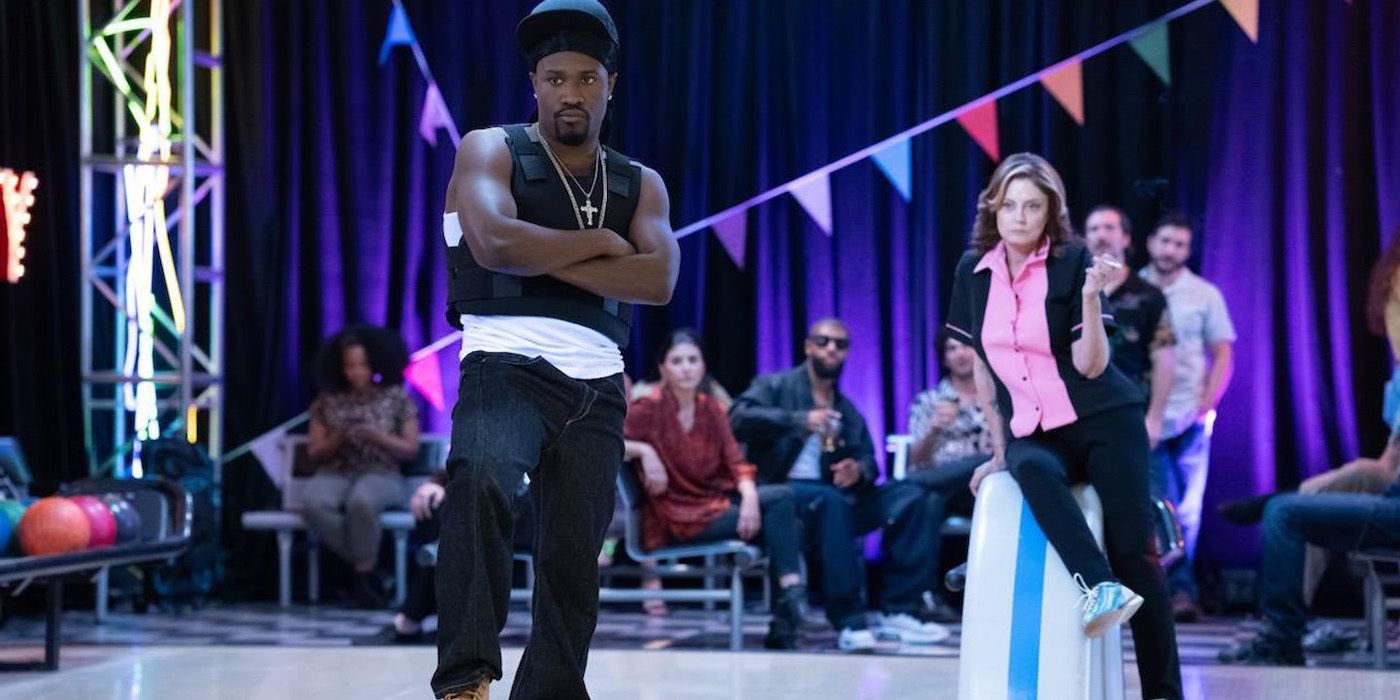 Shameik Moore and Susan Sarandon looking at a bowling alley in The Gutter. 