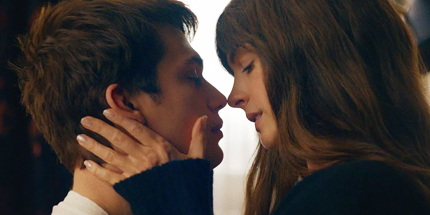 Anne Hathaway and Nicholas Galitzine almost kissing in The Idea of You