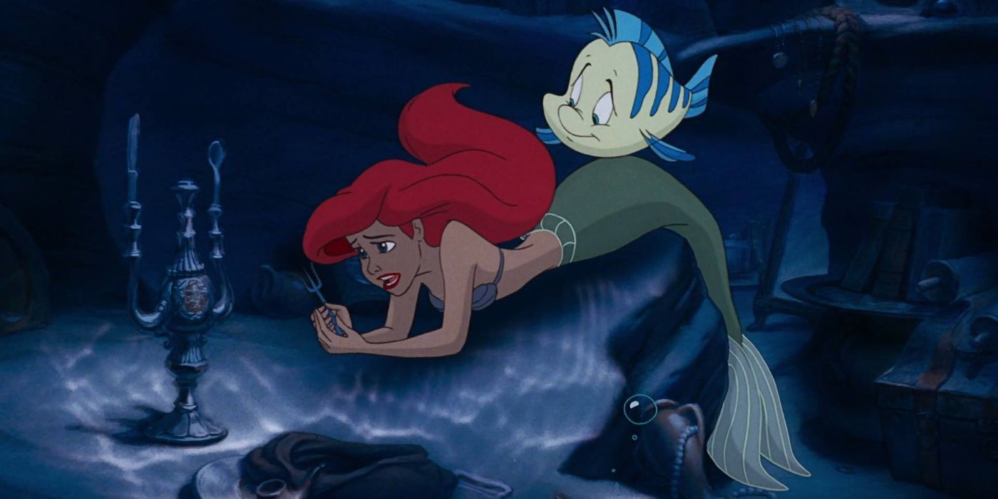 Ariel and Flounder in Ariel's grotto