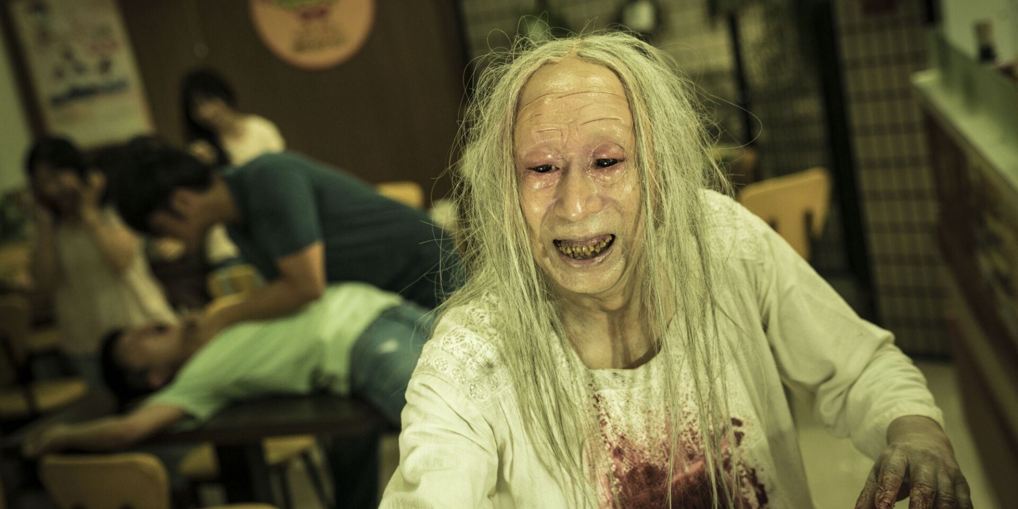 An infected elderly woman in The Sadness (2021)