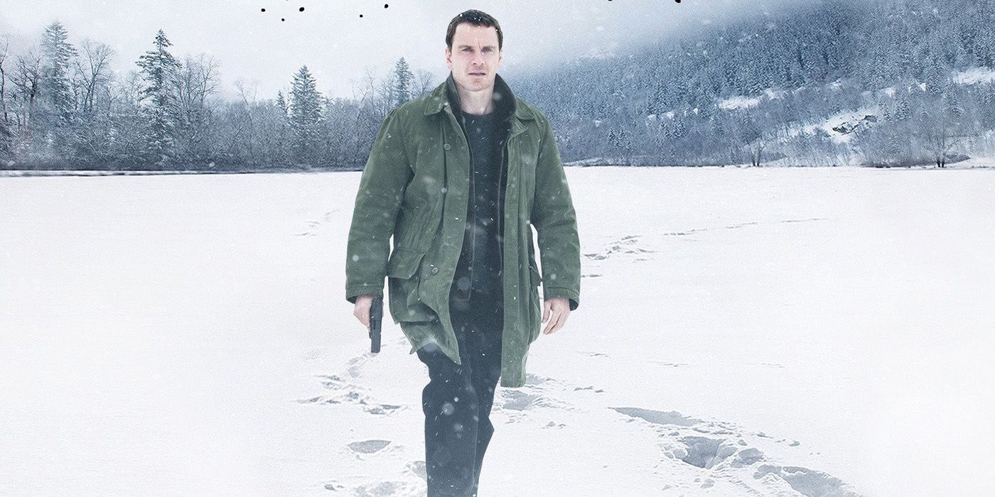 Michael Fassbender walking through a snowy tundra in The Snowman