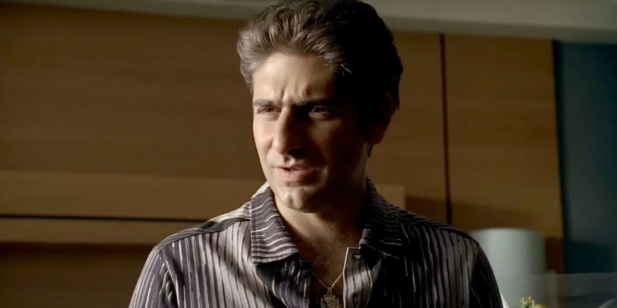 Michael Imperioli as Christopher Moltisanti scowls at someone off camera in The Sopranos