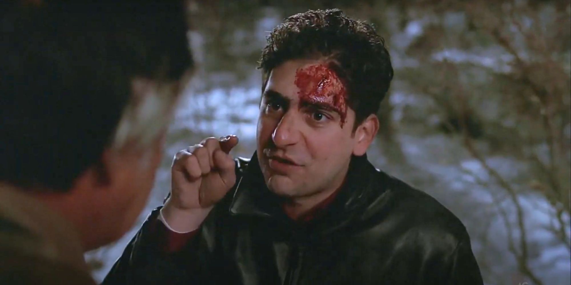 Michael Imperioli yelling at Tony Sirico in the snow covered woods in The Sopranos