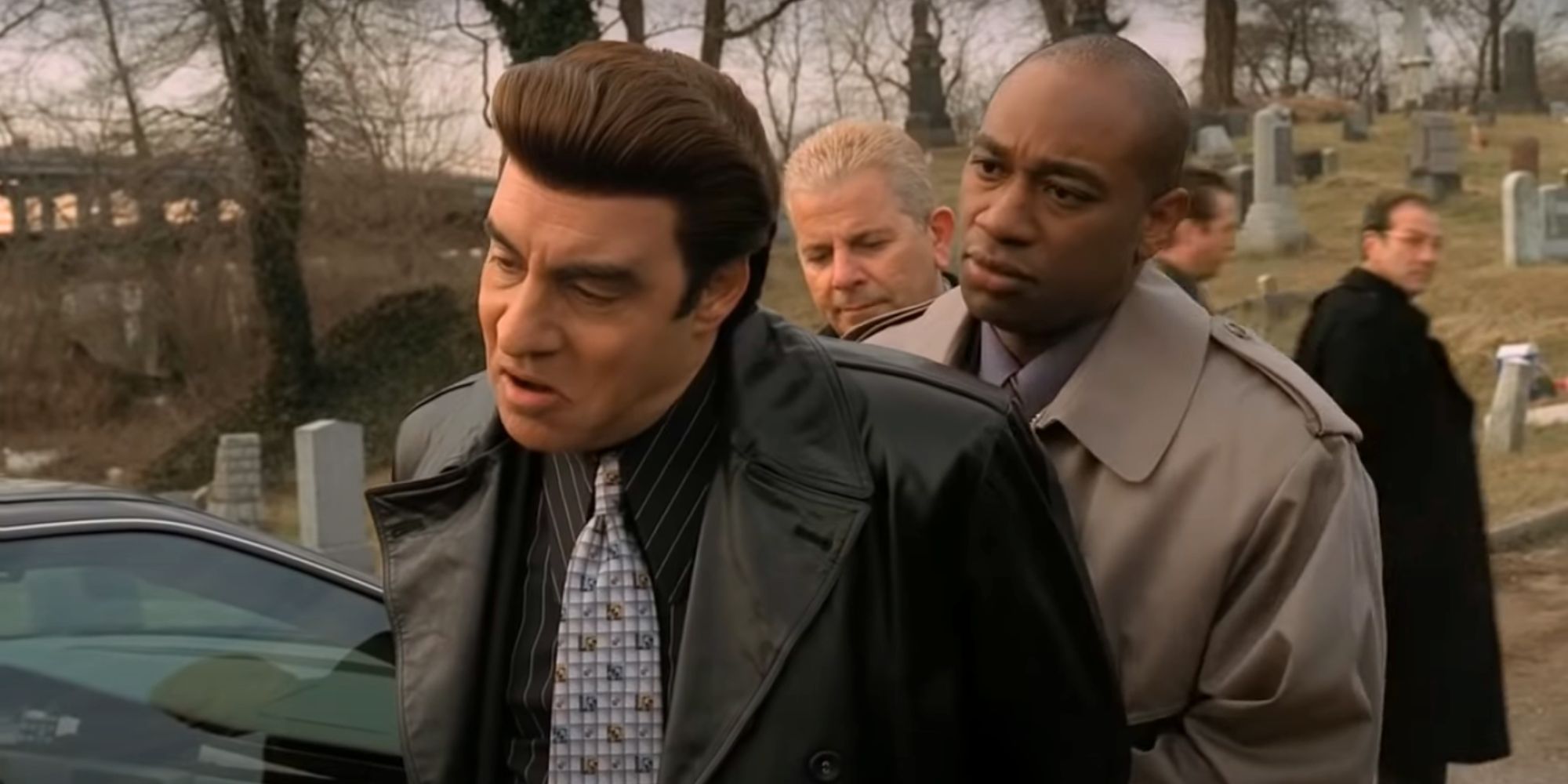 Steven Van Zandt being handcuffed by a detective in The Sopranos