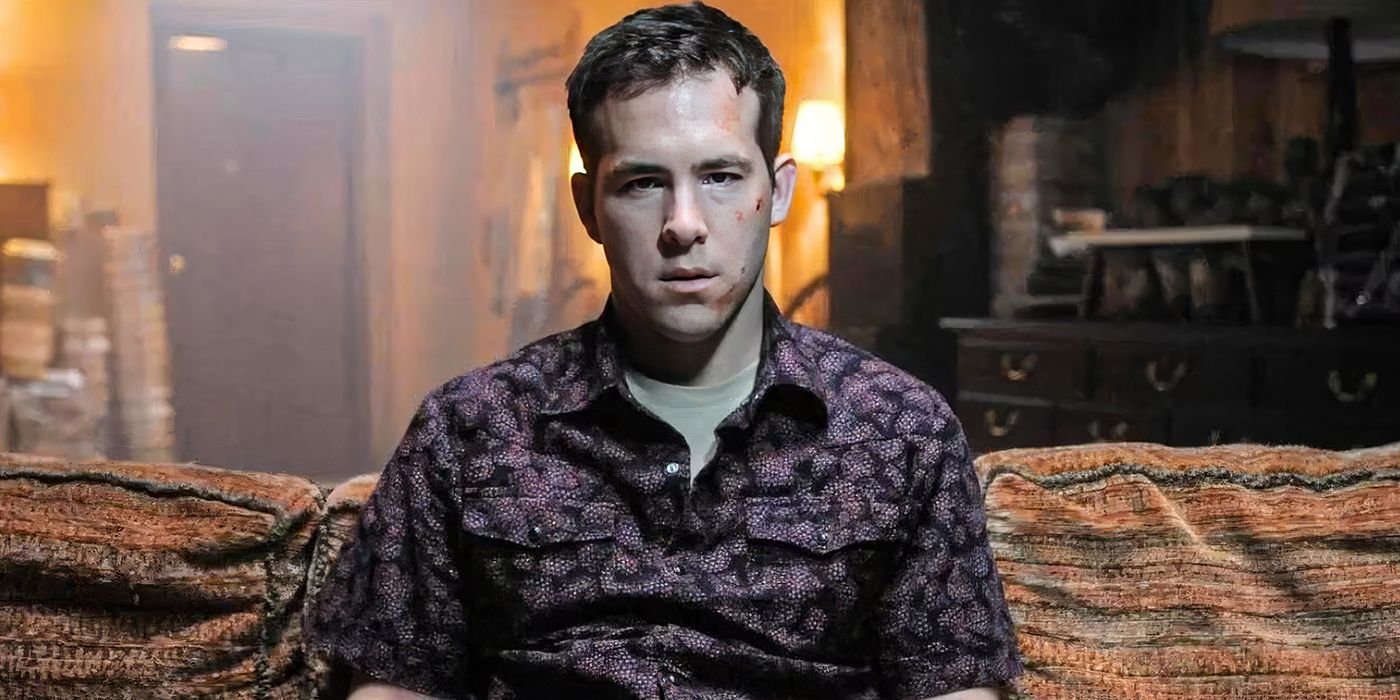 Ryan Reynolds as Jerry Hickfang, staring blankly at the camera with blood on his face in The Voices