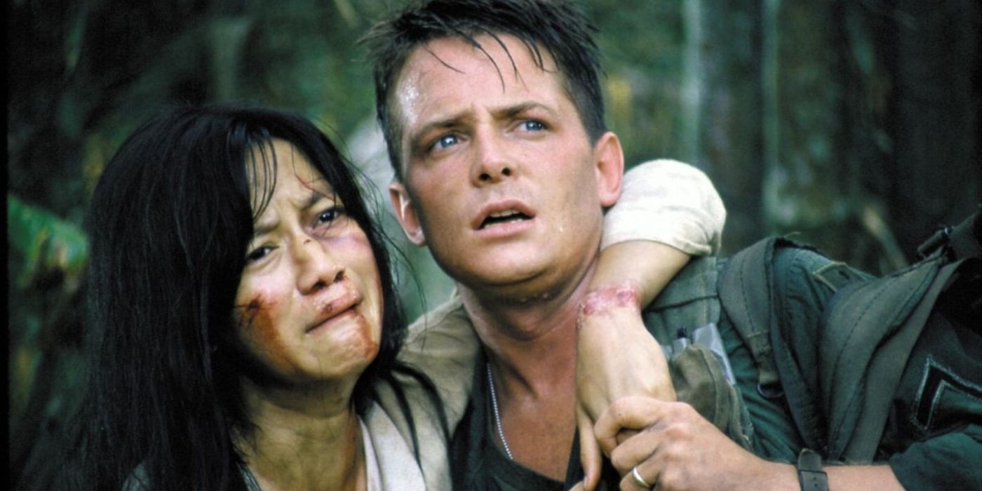 Private Eriksson carrying a wounded Tran Thi Oanh in Casualties of War