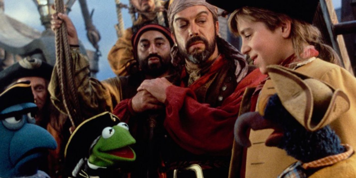 Jim Hawkins and Long John Silver with the Muppets in Muppet Treasure Island