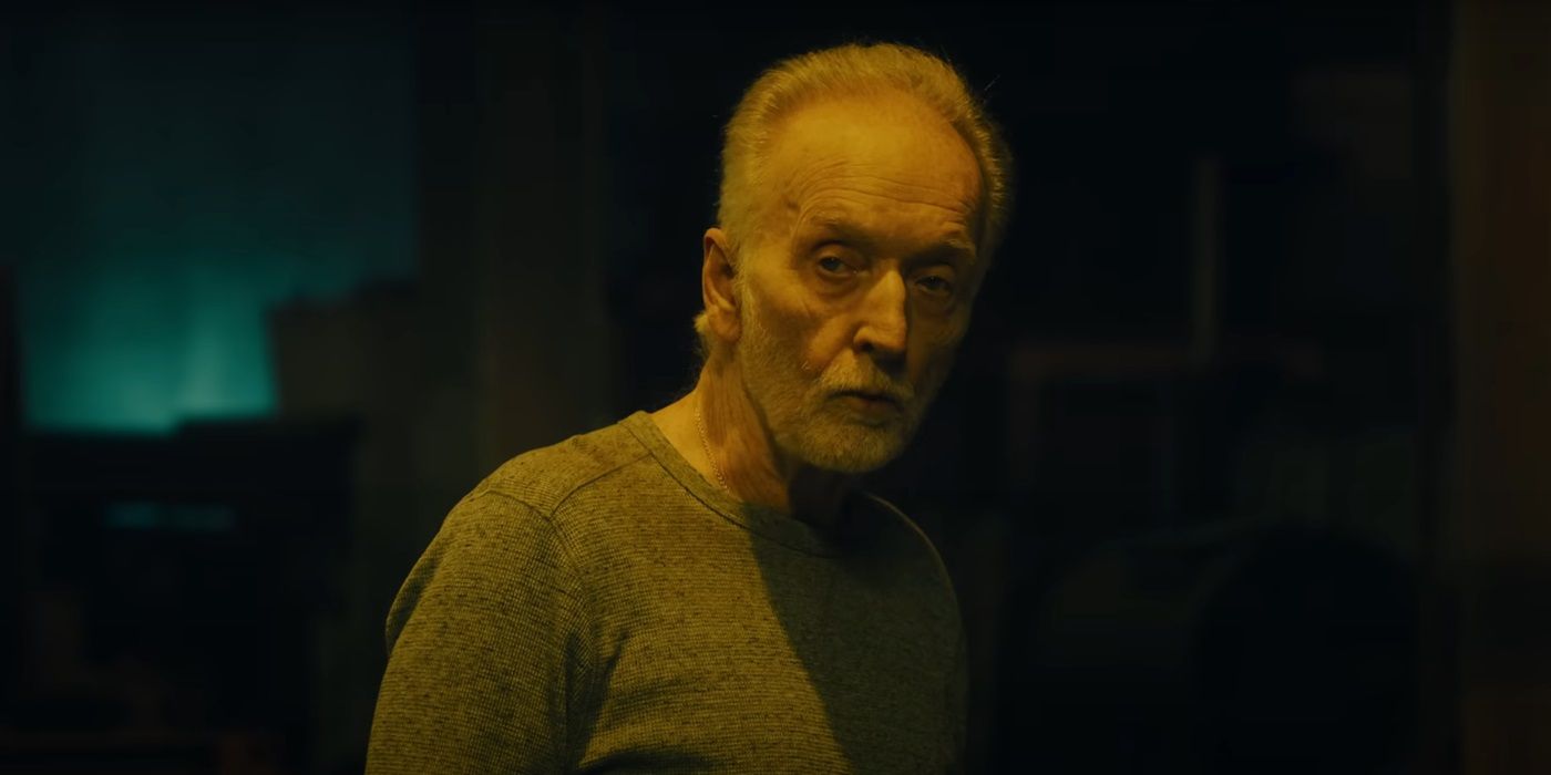 Tobin Bell as John Kramer/Jigsaw staring at a person offscreen in Saw X