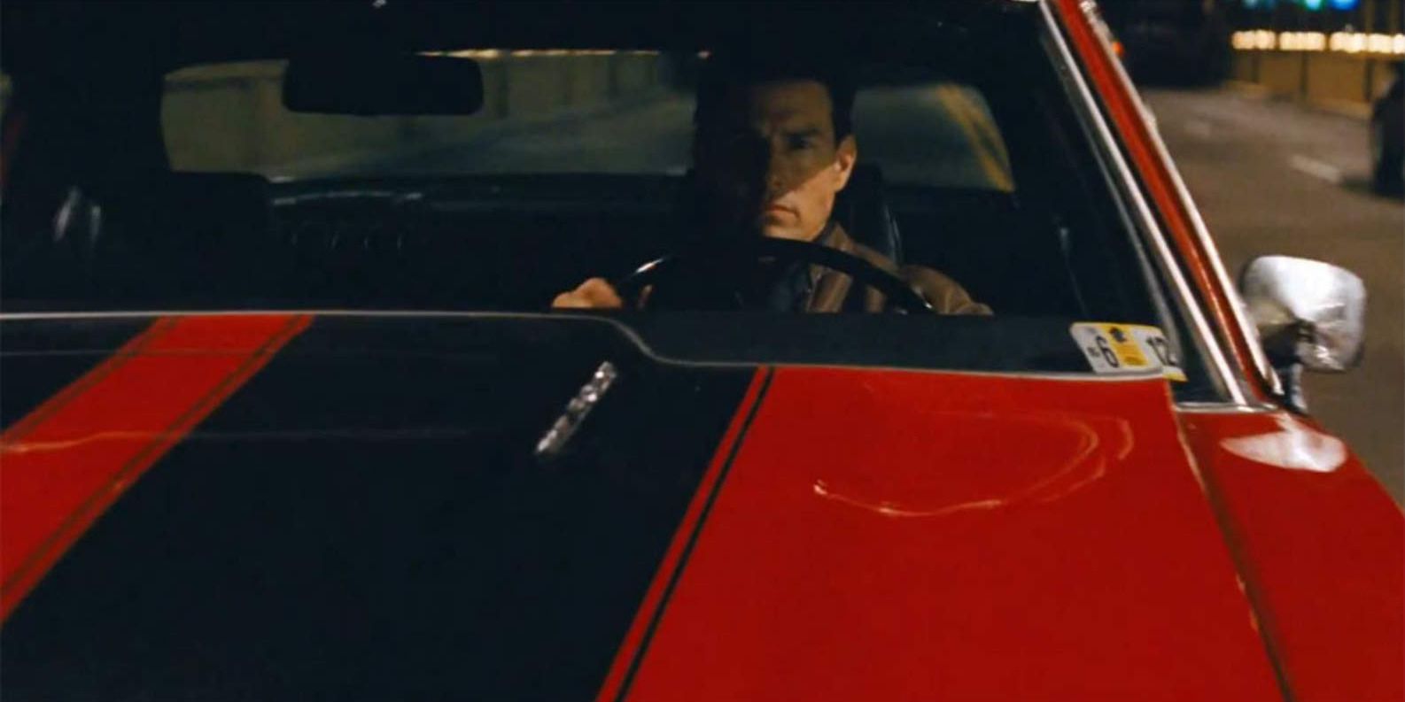 Jack Reacher (Tom Cruise) driving a red muscle car during a chase in &lsquo;Jack Reacher&rsquo;
