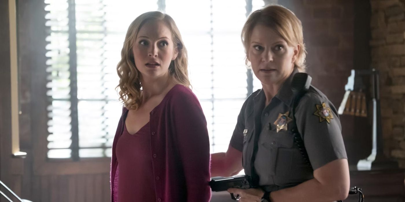 Caroline Forbes (Candice King) and Sheriff Liz Forbes (Marguerite MacIntyre) looking at something offscreen in The Vampire Diaries