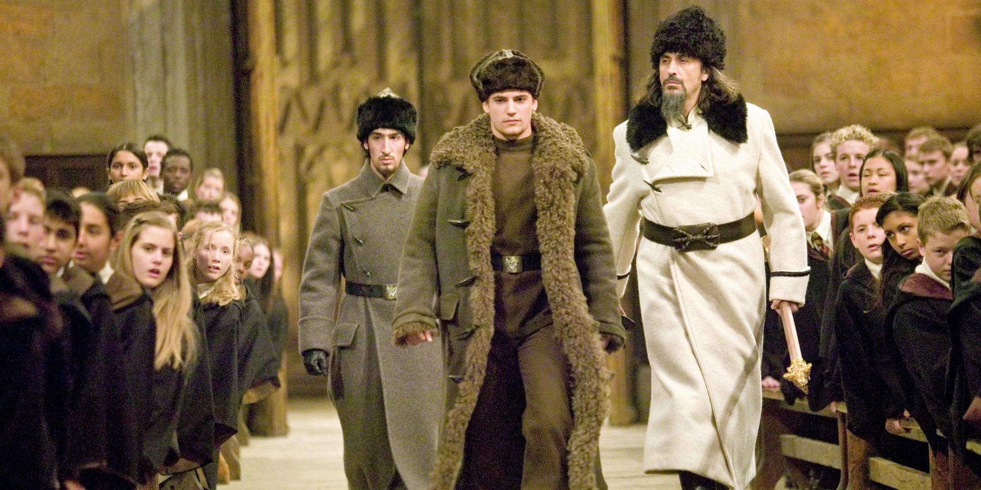 Viktor Krum and Igor Karkaroff enter the Hogwarts Great Hall for the Triwizard Tournament