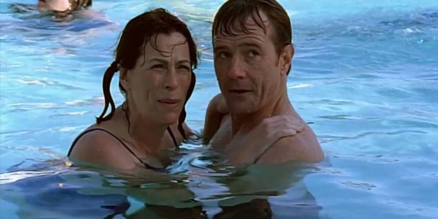 Lois and Hal embrace in a pool