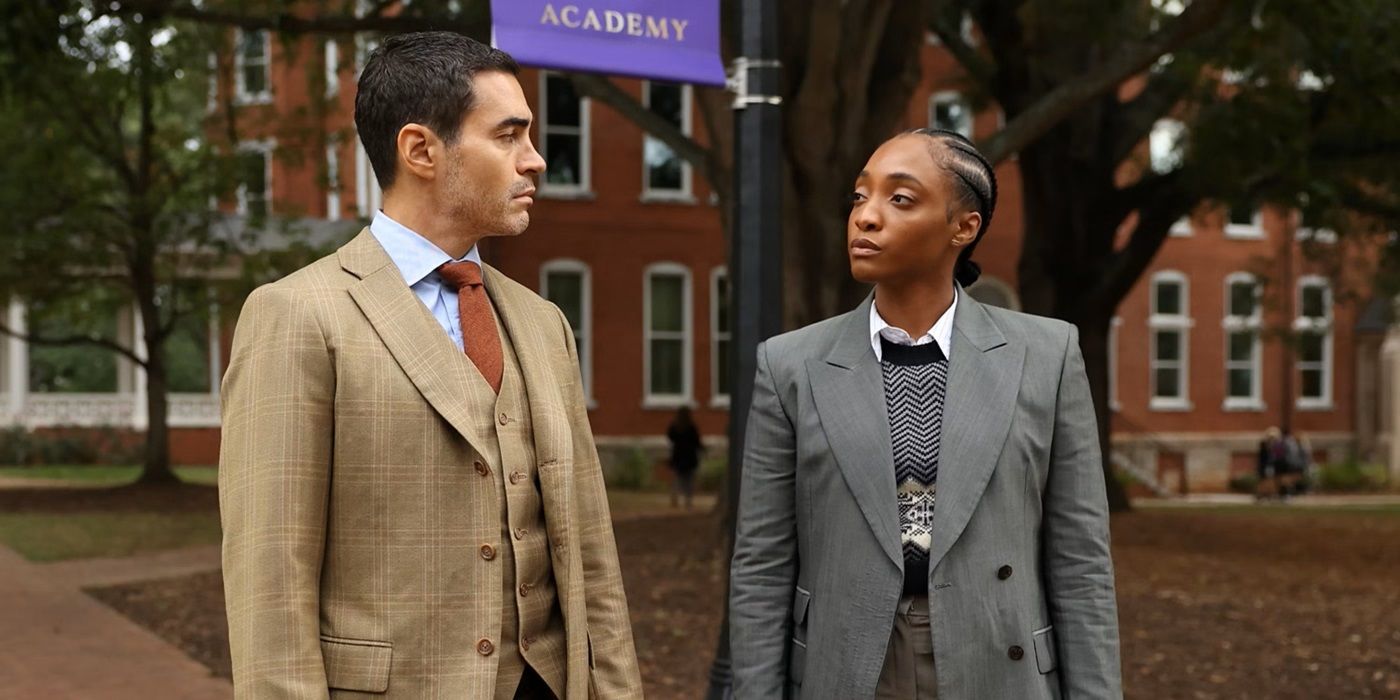 Ramón Rodríguez as Will Trent standing with Iantha Richardson as Mitchell outside a school in 'Will Trent'