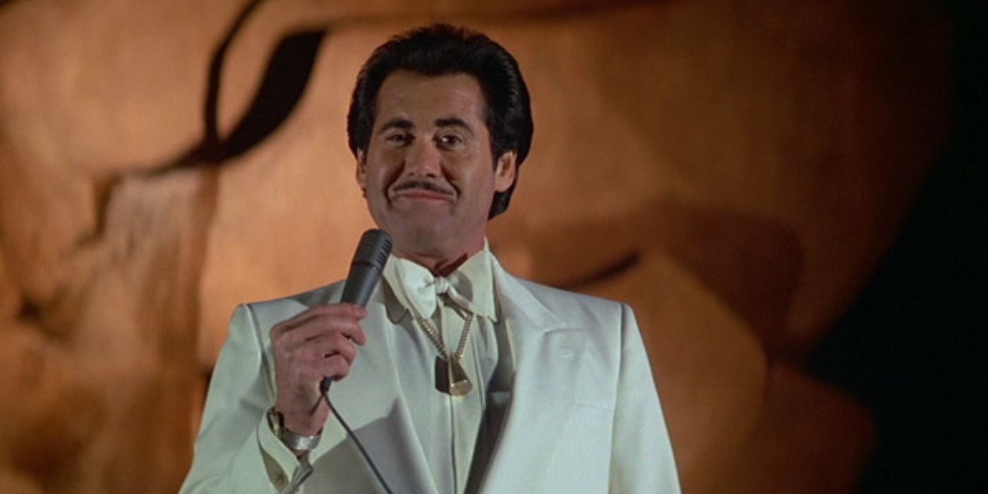Wayne Newton holding a microphone in &lsquo;License to Kill&rsquo;
