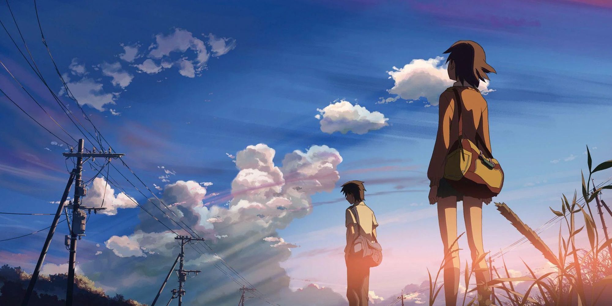 Takaki walks in front of Kanae underneath a blue sky in '5 Centimeters per Second'