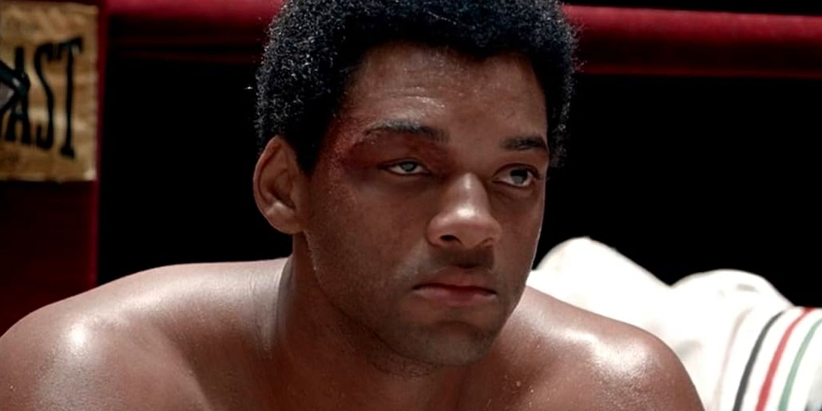 A battered Muhammad Ali (Will Smith) recovering in a ring corner in Ali