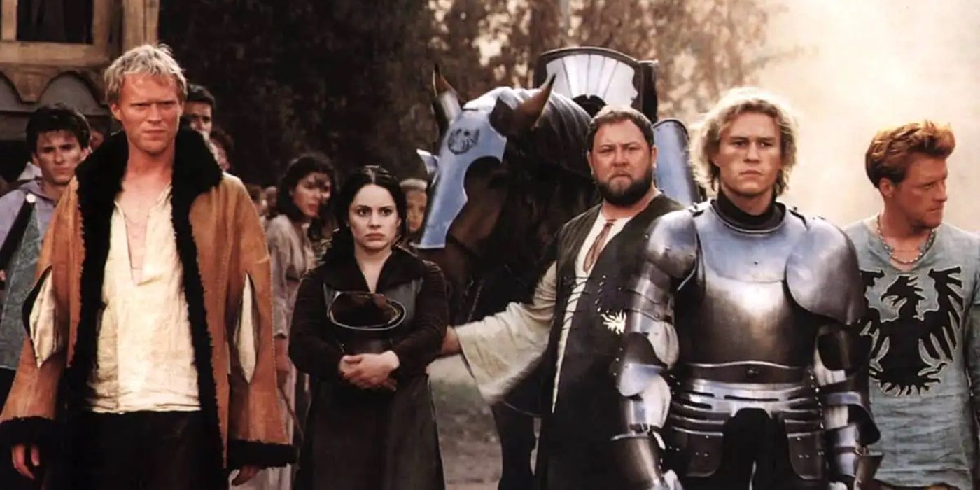 The ensemble cast of A Knight&rsquo;s Tale standing together in a field