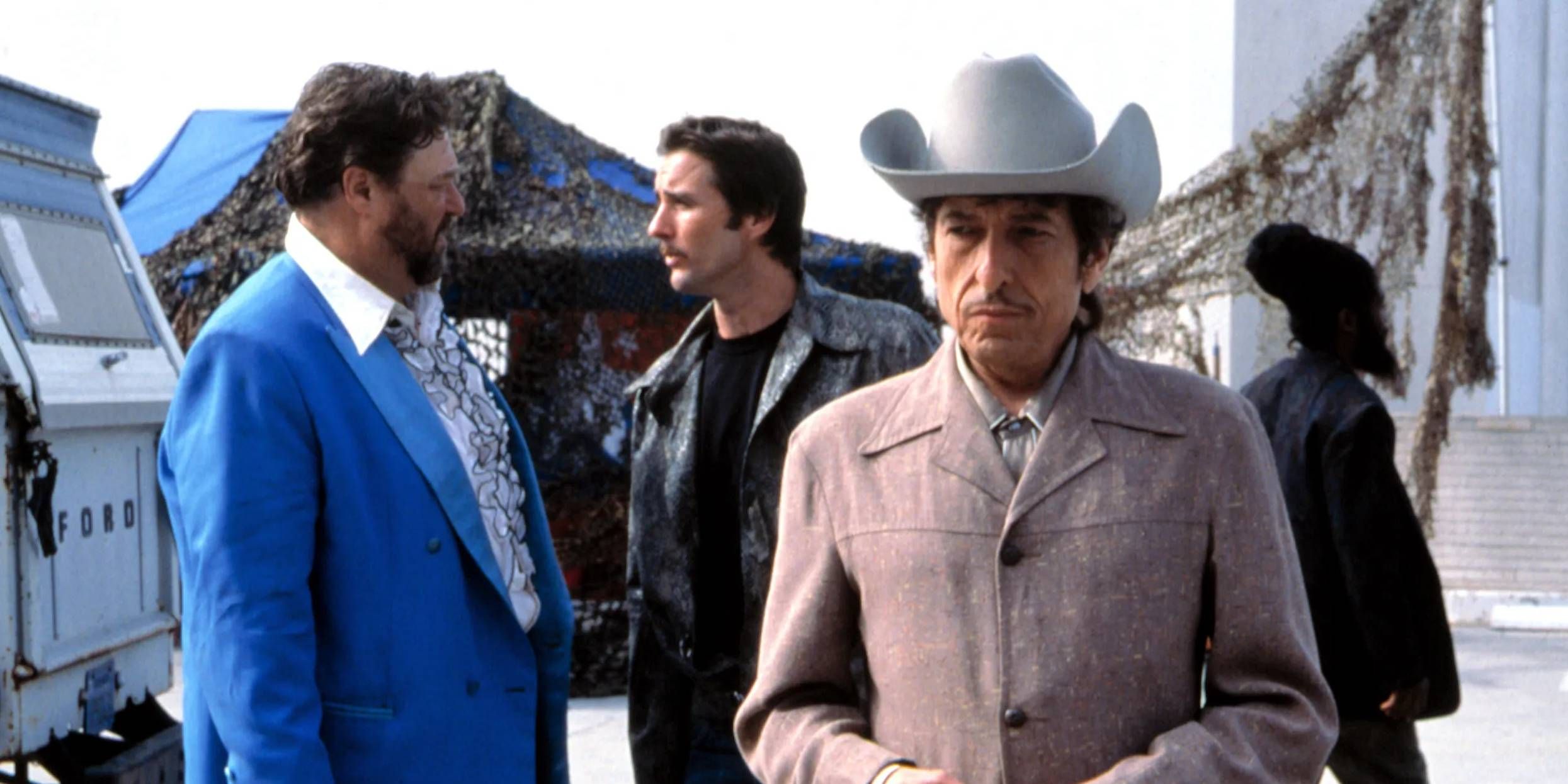 Bob Dylan, John Goodman, and Luke Wilson in "Masked and Anonymous"