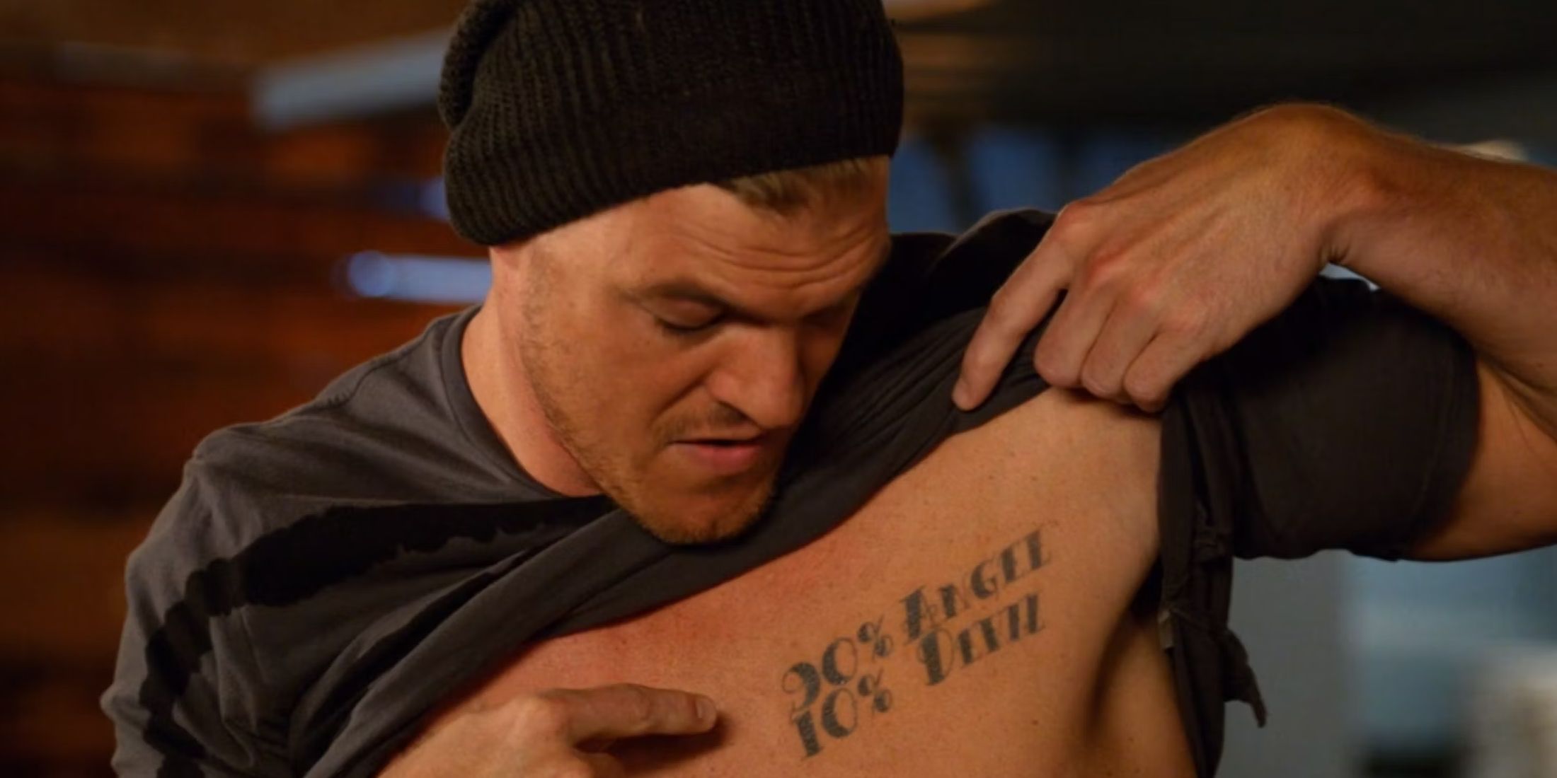Close up of Alan Ritchson as Matt showing tattoos in New Girl