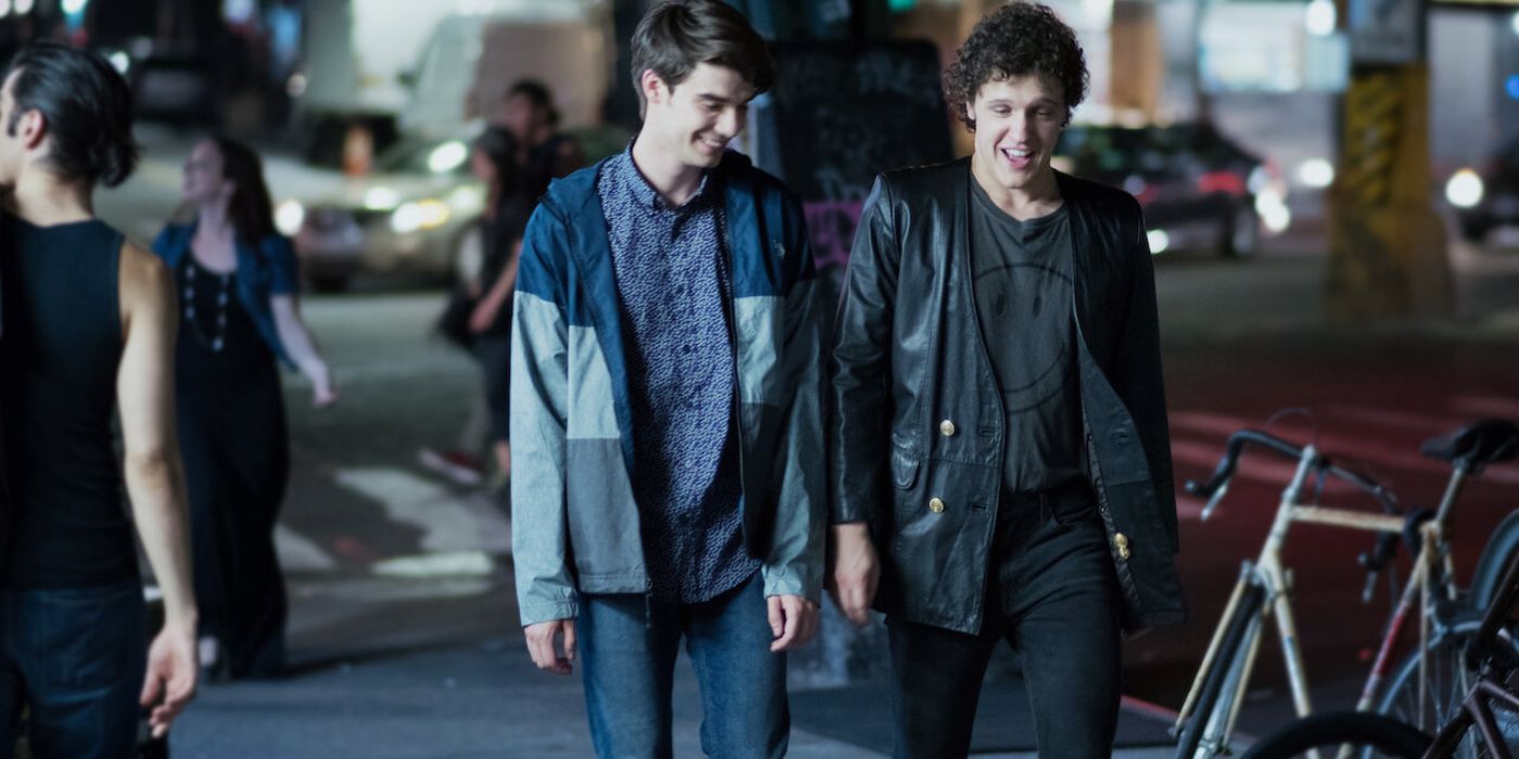 Alex and Elliot walking down the street laughing in Alex Strangelove