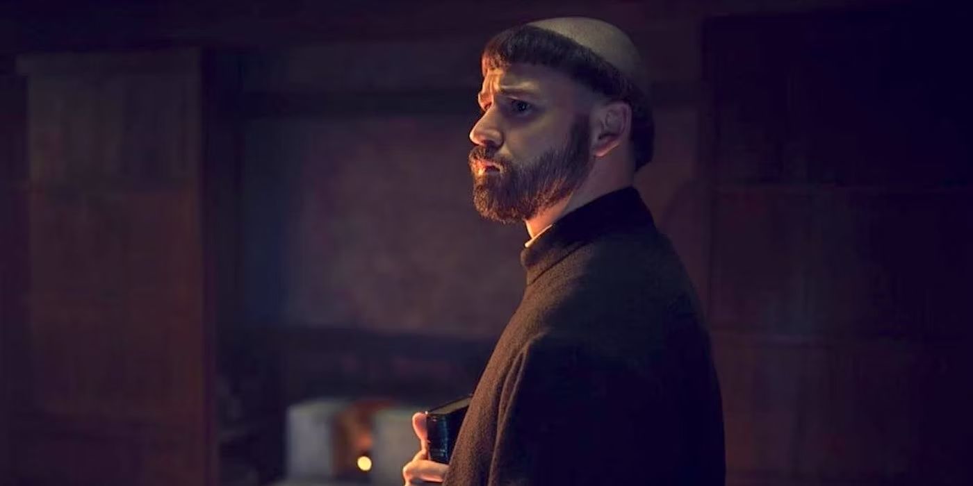 Marvin Alvito standing still and looking intently at something off-camera in Shogun