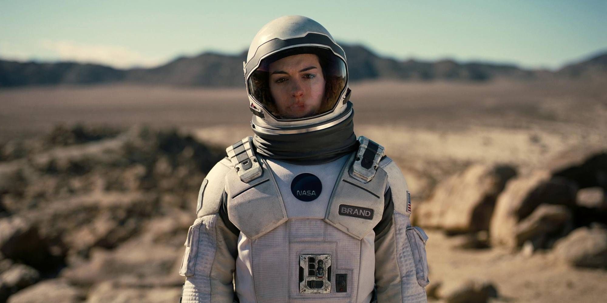 Anne Hathaway with an astronaut suit in Interstellar.