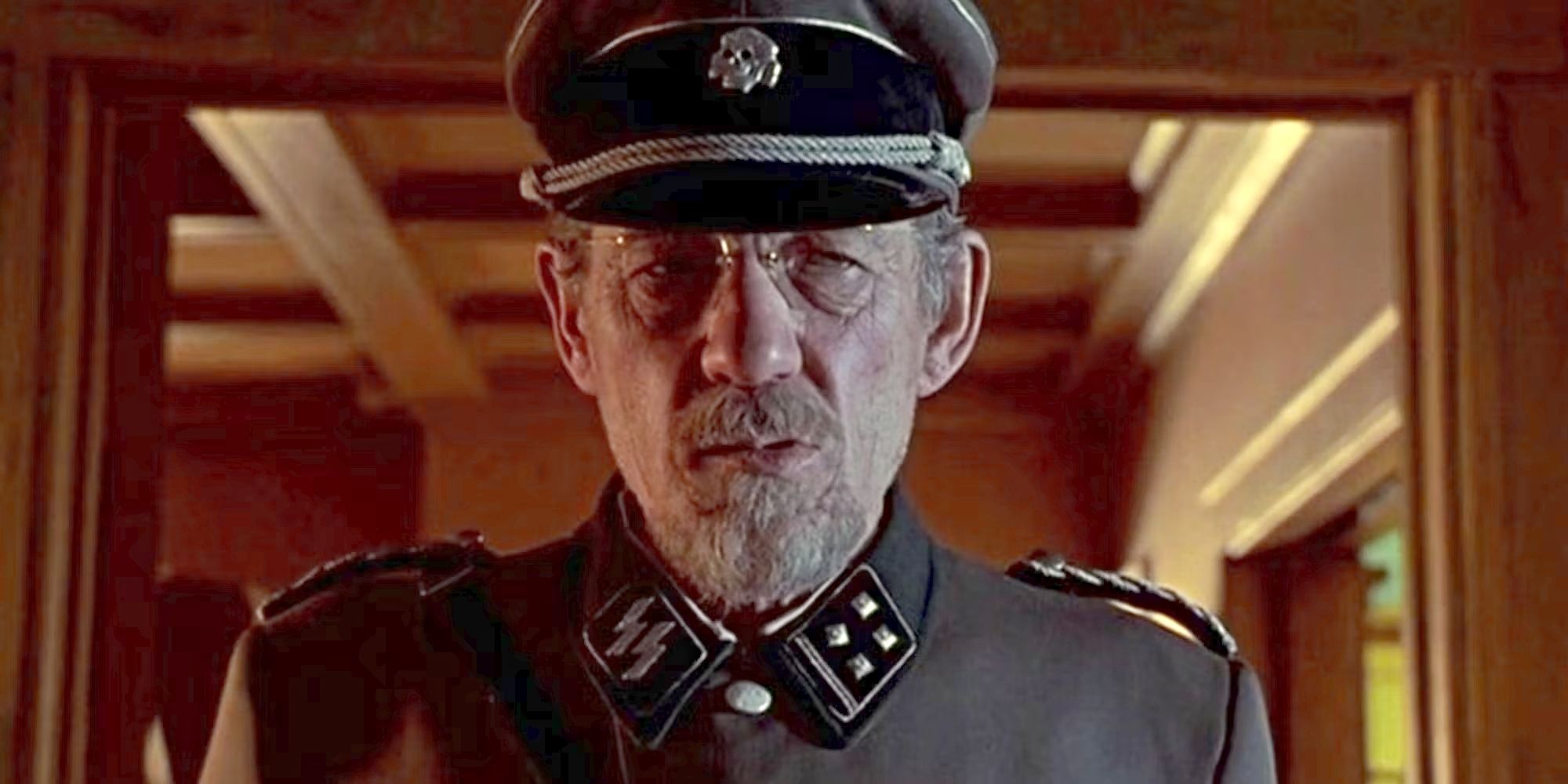 Ian McKellen as Kurt Dussander, wearing a Nazi uniform in Apt Pupil
