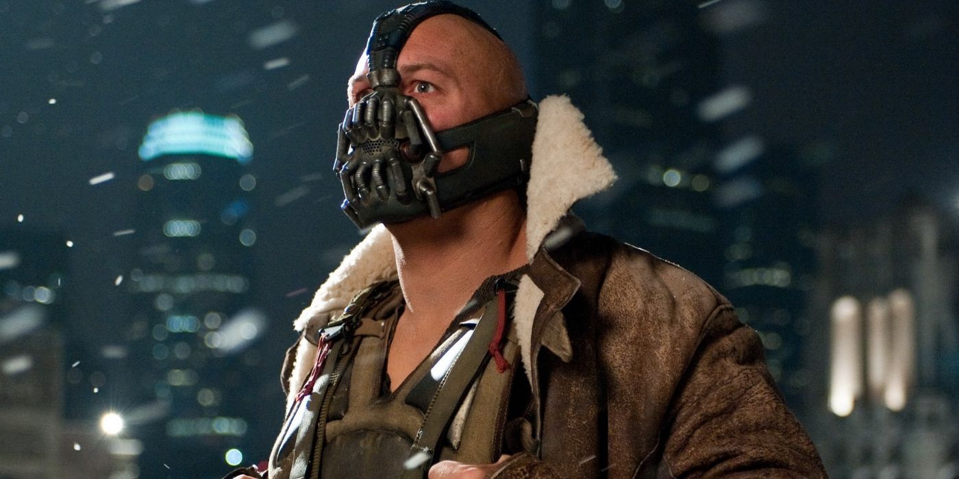 Bane, clad in his iconic mask, looking intently in The Dark Knight Rises