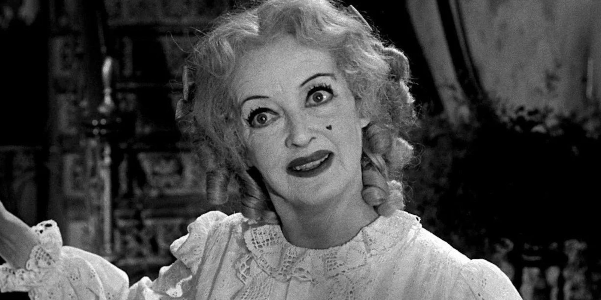 Baby Jane Hudson smiling widely in What Ever Happened to Baby Jane?