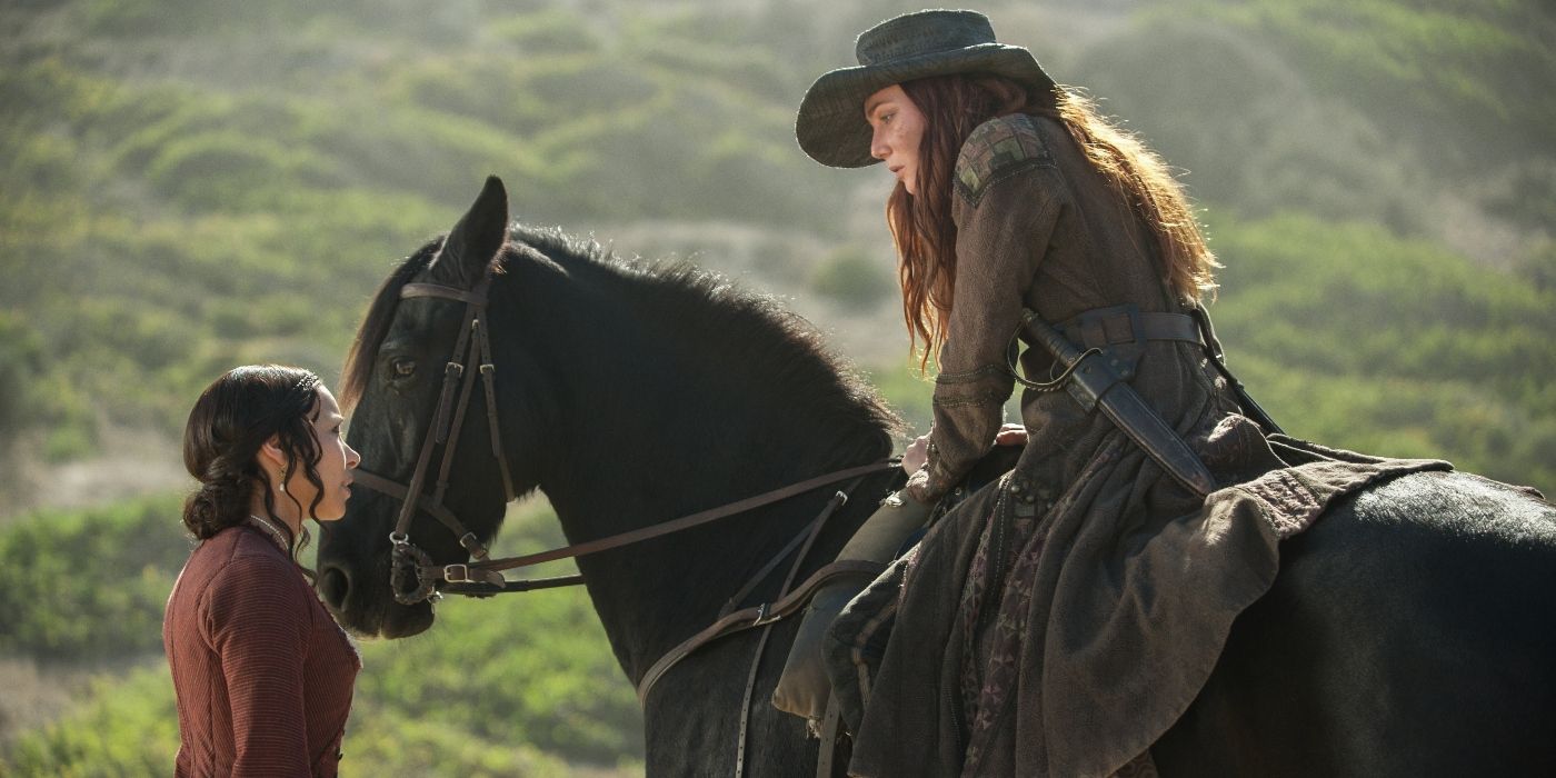 Jessica Parker Kennedy standing in front of Clara Paget on a horse in Black Sails Season 3