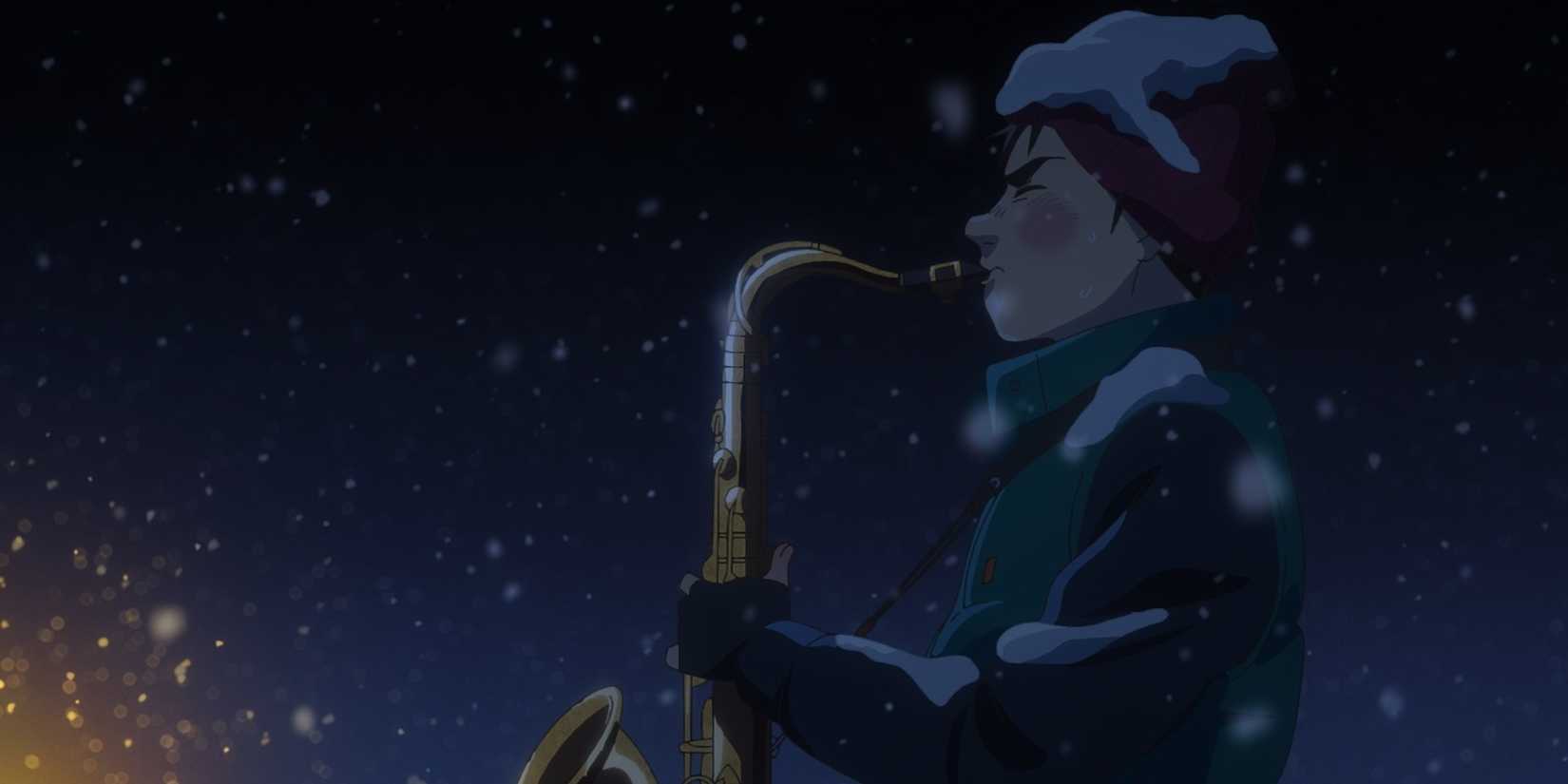 A still from Blue Giant featuring Dai Miyamoto about to play the saxophone outside at night while it is snowing