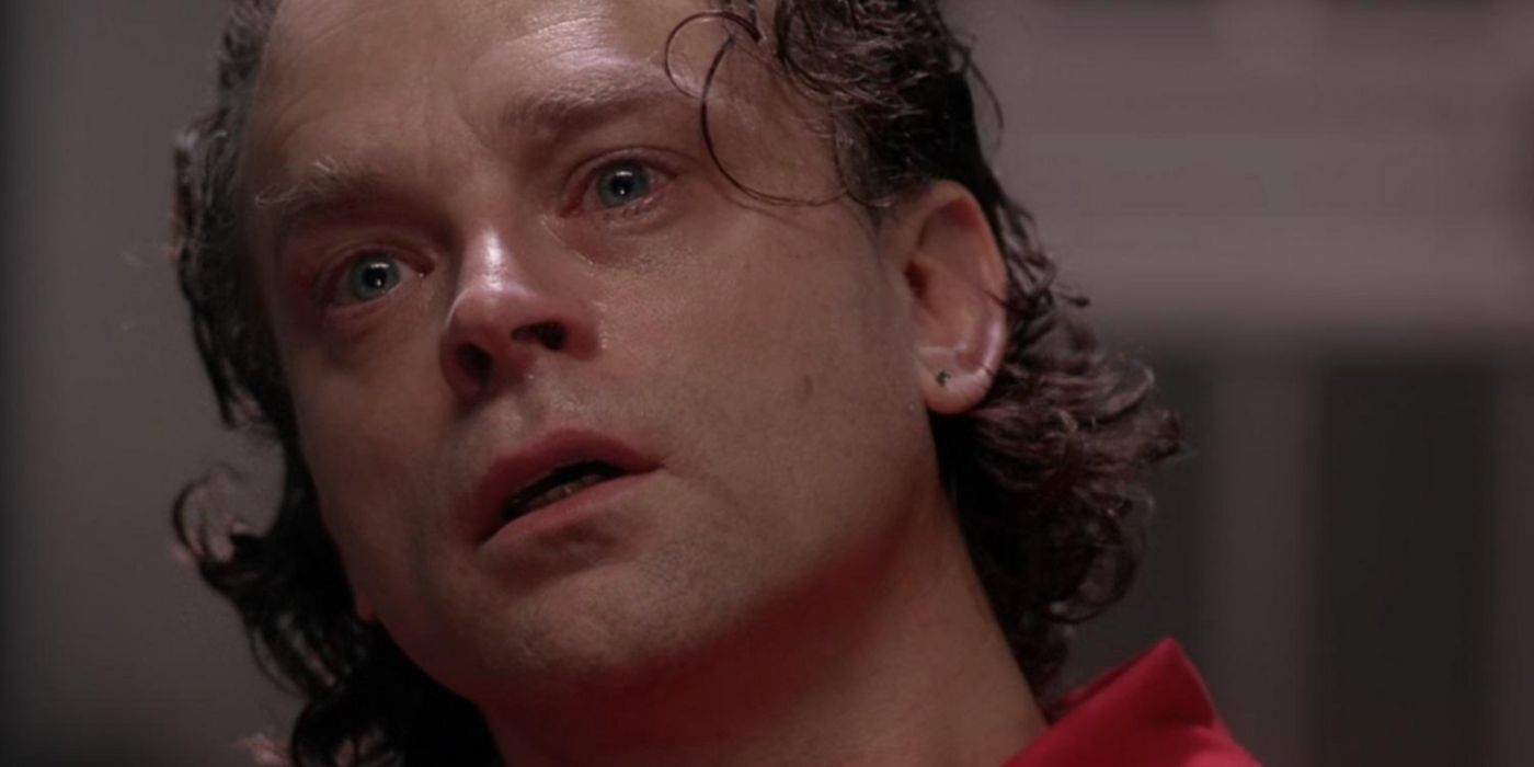 Brad Dourif looks up as he sees a vision from prison cell in Beyond the Sea in The X-Files