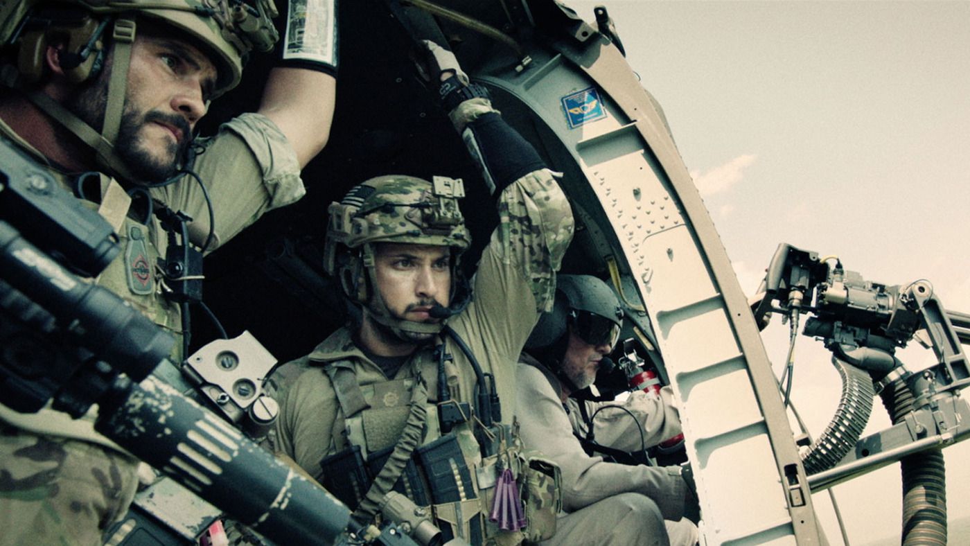 Seal Team Six Riding in a helicopter. 