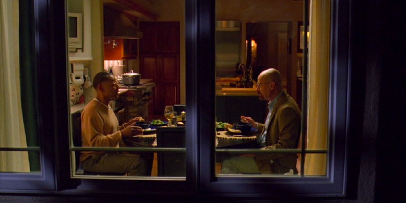 Gus and Walter White have dinner. 