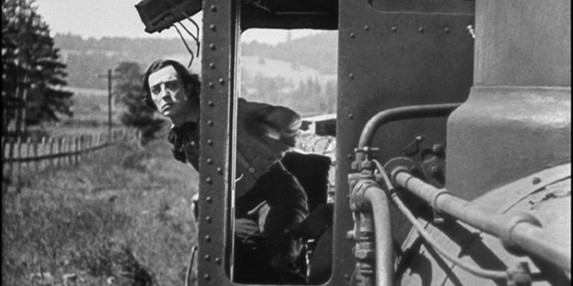 Buster Keaton looking out from inside a train in The General 1926