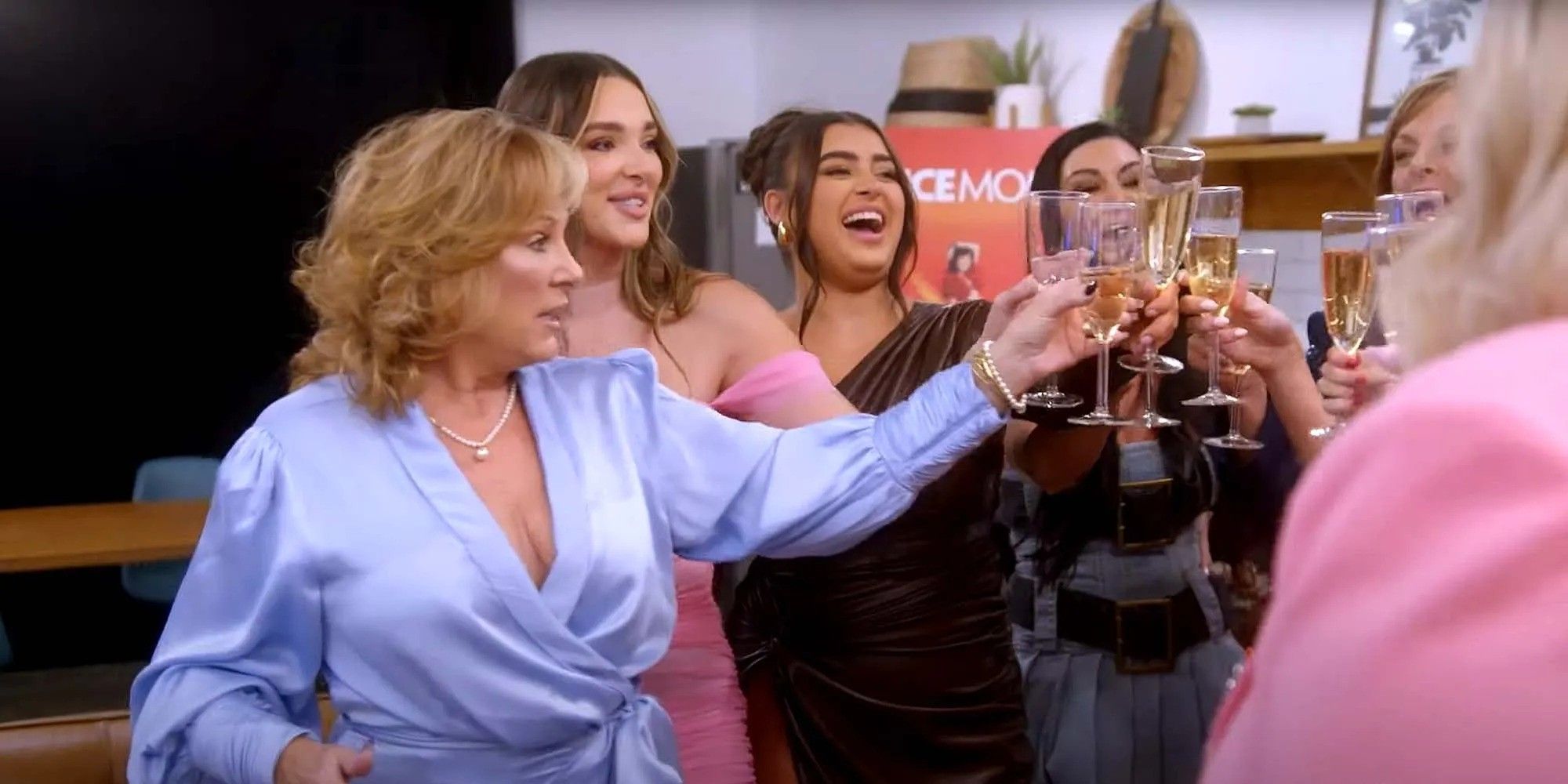 The cast of Dance Moms: The Reunion toasts in celebration