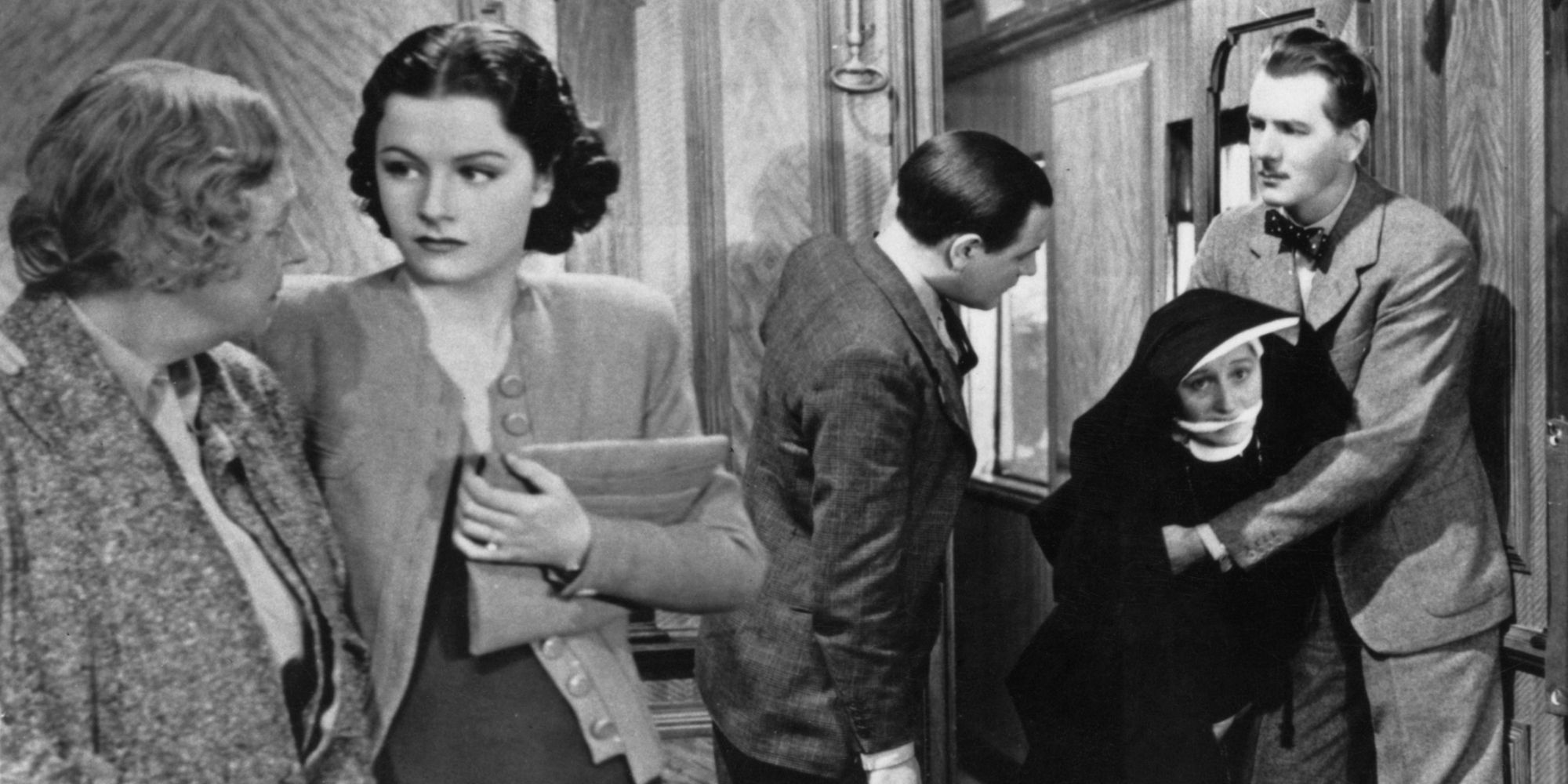 Catherine Lacey, Margaret Lockwood, Michael Redgrave, Naunton Wayne, and May Whitty in The Lady Vanishes 