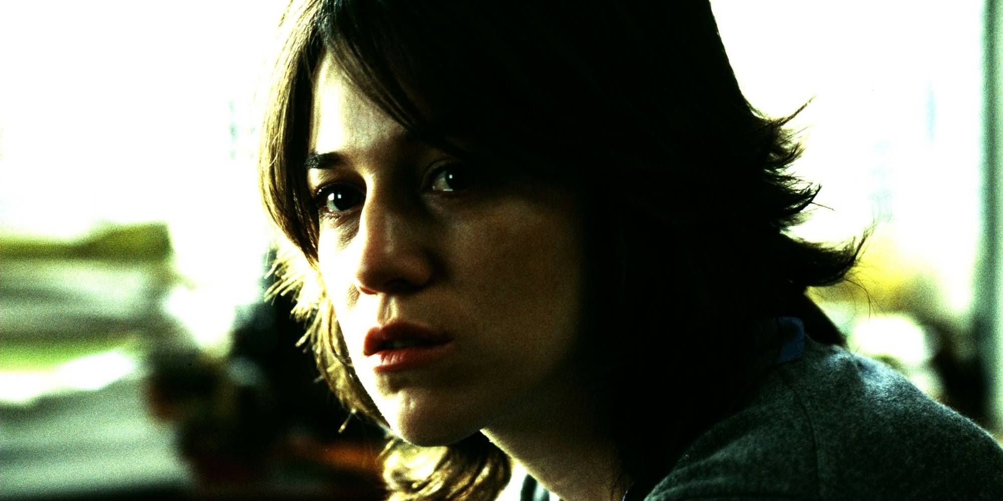 Close-up shot of Charlotte Gainsbourg looking sad in 21 Grams.