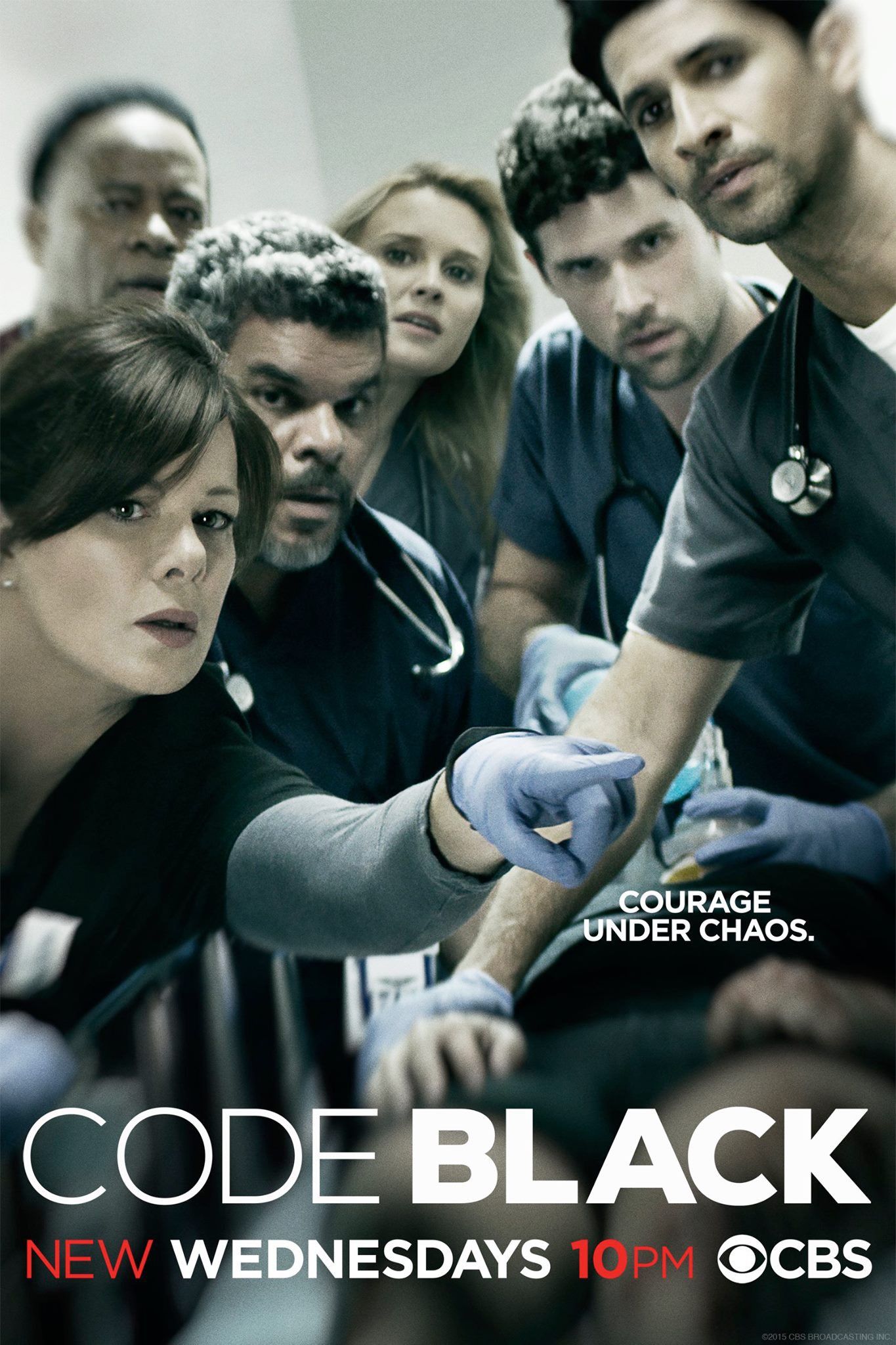 A group of doctors around a patient in the E.R. for the show Code Black