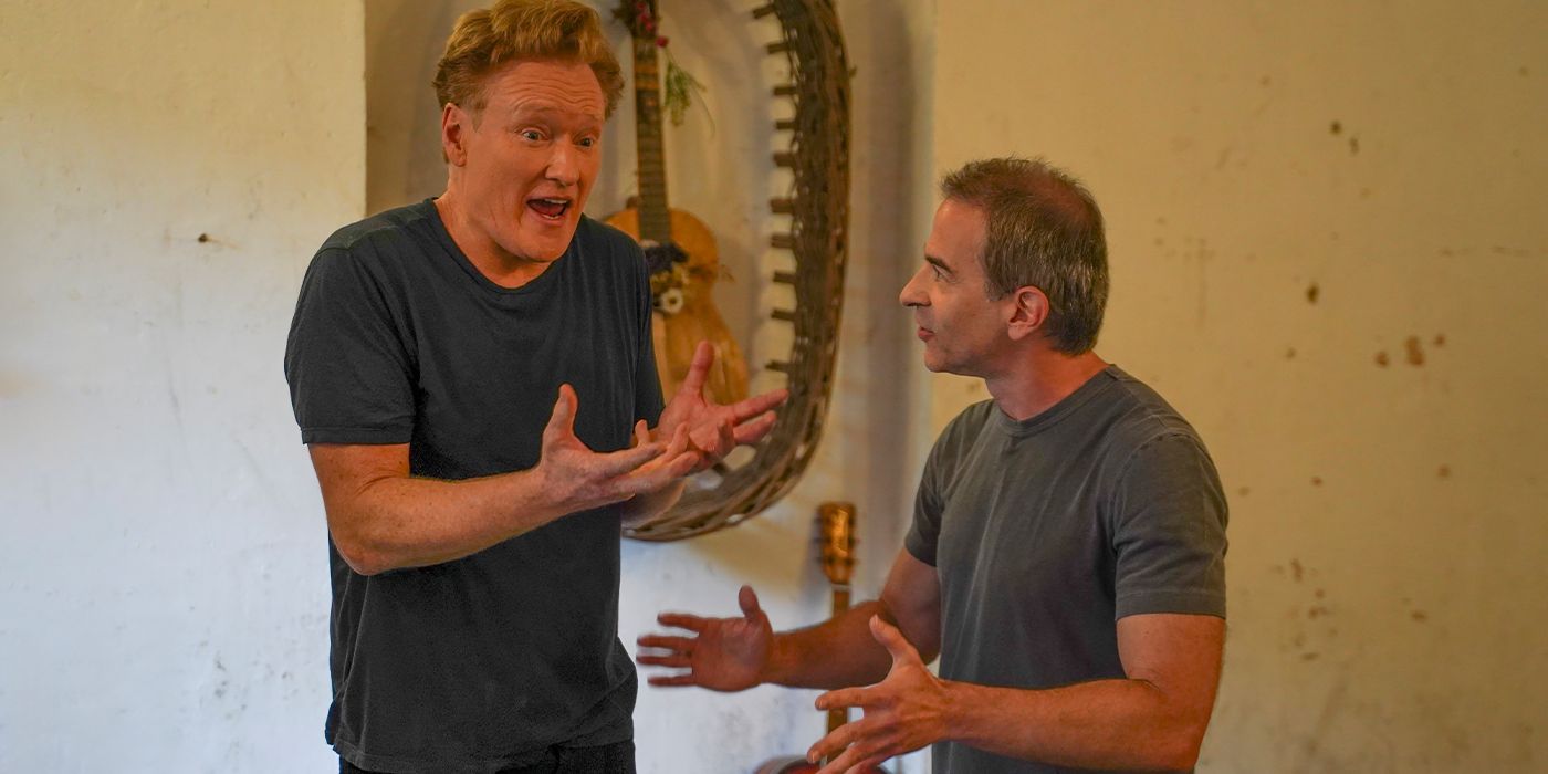 Conan O'Brien gestures angrily to Jordan Schlansky in a scene from Conan O'Brien Must Go