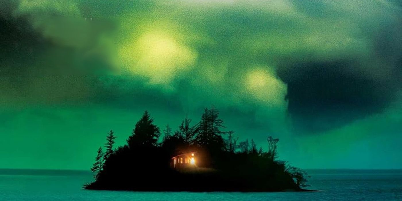 A small island with a single house and a single light surrounded by green water and lighting on the cover of Northwest Angle by William Kent Krueger