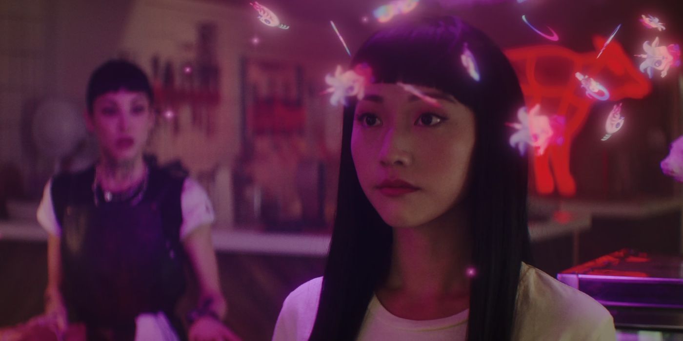 Yuyo Kitamura with pink neon swirls around her head in Dead Boy Detectives