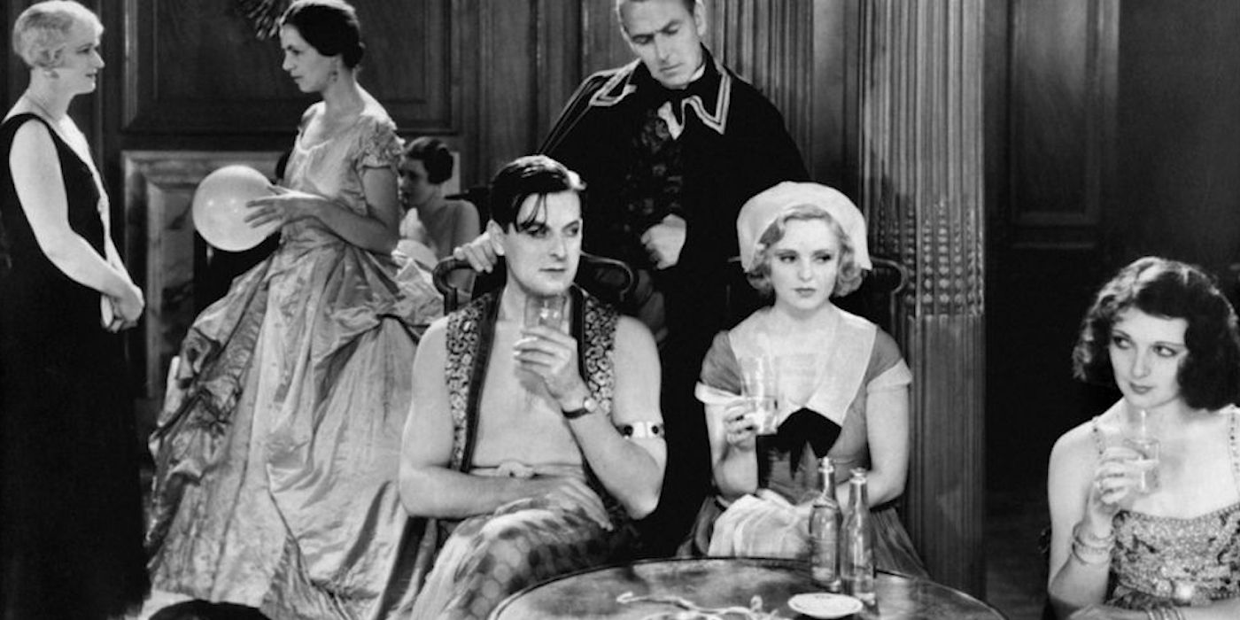 Henry Kendall and Joan Barry as Fred and Emily Hill having drinks with the Princess (Betty Amann) in East of Shanghai