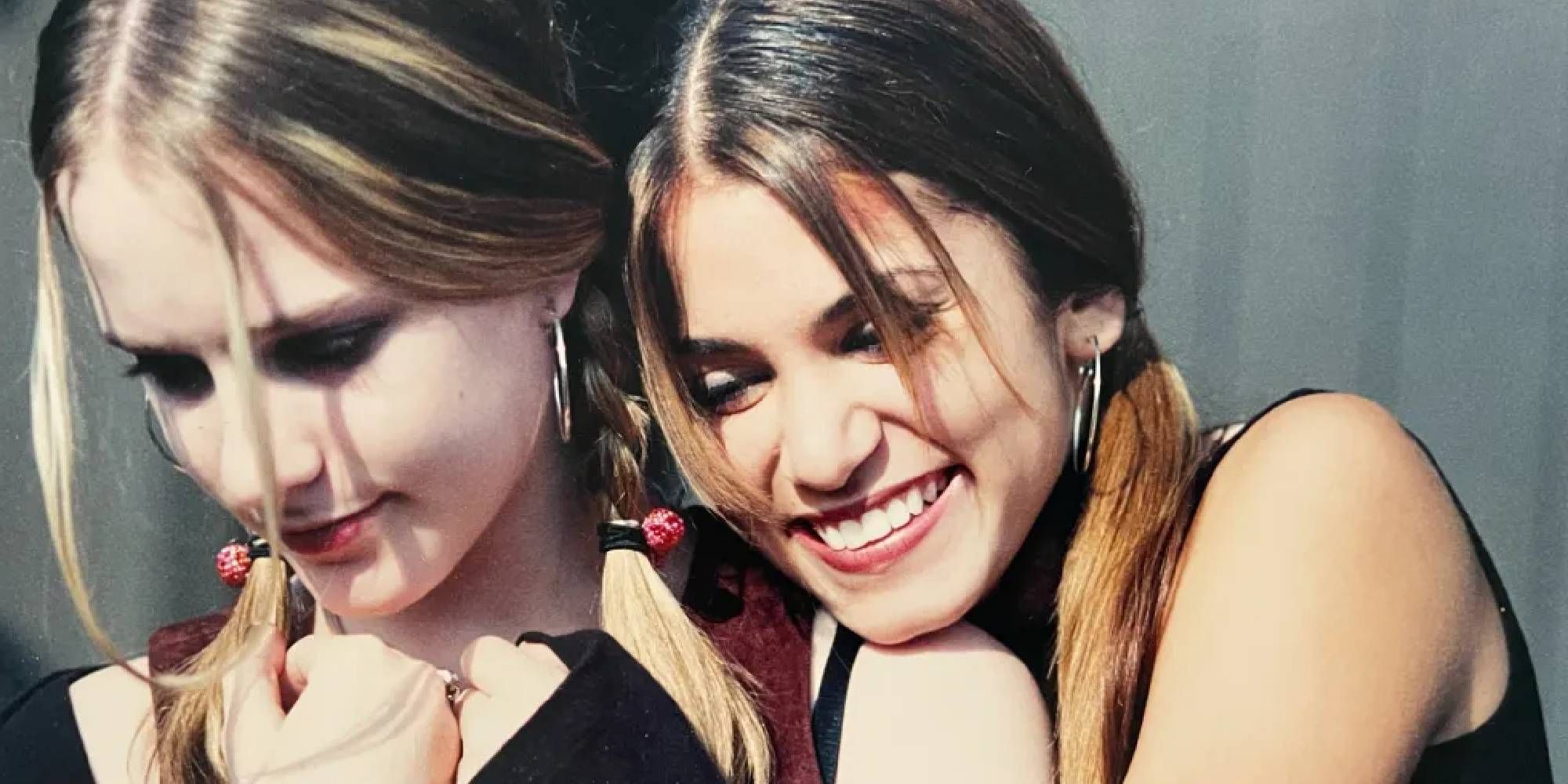 Evan Rachel Wood as Tracy and Nikki Reed as Evie in Thirteen close-up shot.