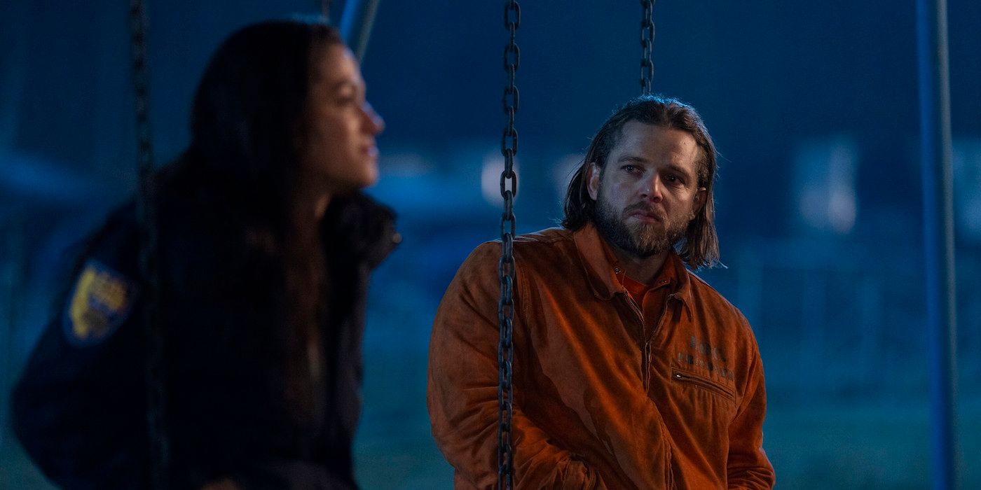 Gabriella Perez (Stephanie Arcila) and Bode Leone (Max Thieriot) sit on swings on 'Fire Country'