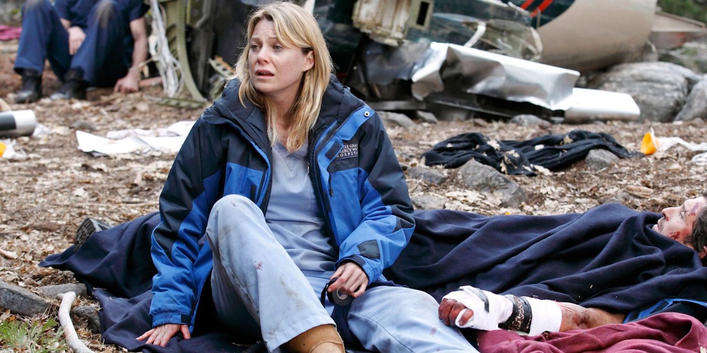 A doctor tends to a patient of a plane crash