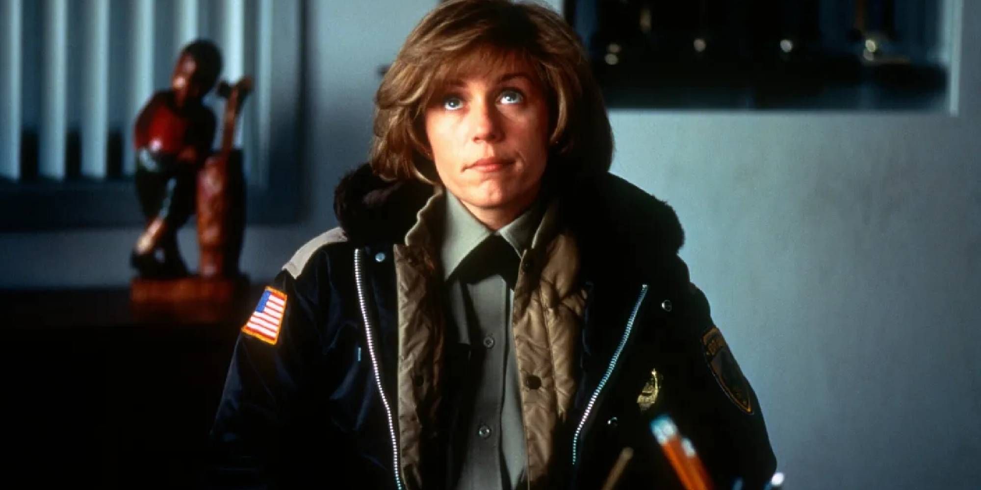 Frances McDormand as Marge looking up in Fargo.